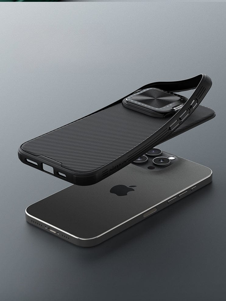 A Shockproof Slim Fit iPhone 16 Pro Max Case with MagSafe, Dual-Layer Protection & Camera Cover in black hovers above a black smartphone laying face down on a grey surface.
