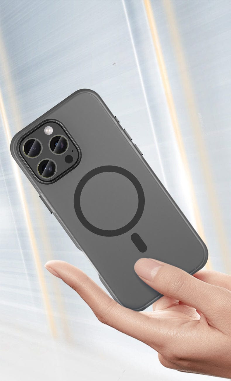 A hand holds a dark-colored smartphone featuring a large circular design and three cameras on the back, encased in an iPhone 16 Pro Max Frosted Semi-Transparent MagSafe Case with anti-fingerprint and shockproof protection.