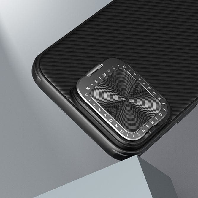 Close-up of the Shockproof Slim Fit iPhone 16 Pro Max Case with MagSafe, featuring dual-layer protection. The case showcases a textured, rotating metal ring on the back with the words "SIMPLICITY," "PERFECTION," and "INNOVATION" engraved around it. Additionally, enjoy an anti-slip grip for added security.