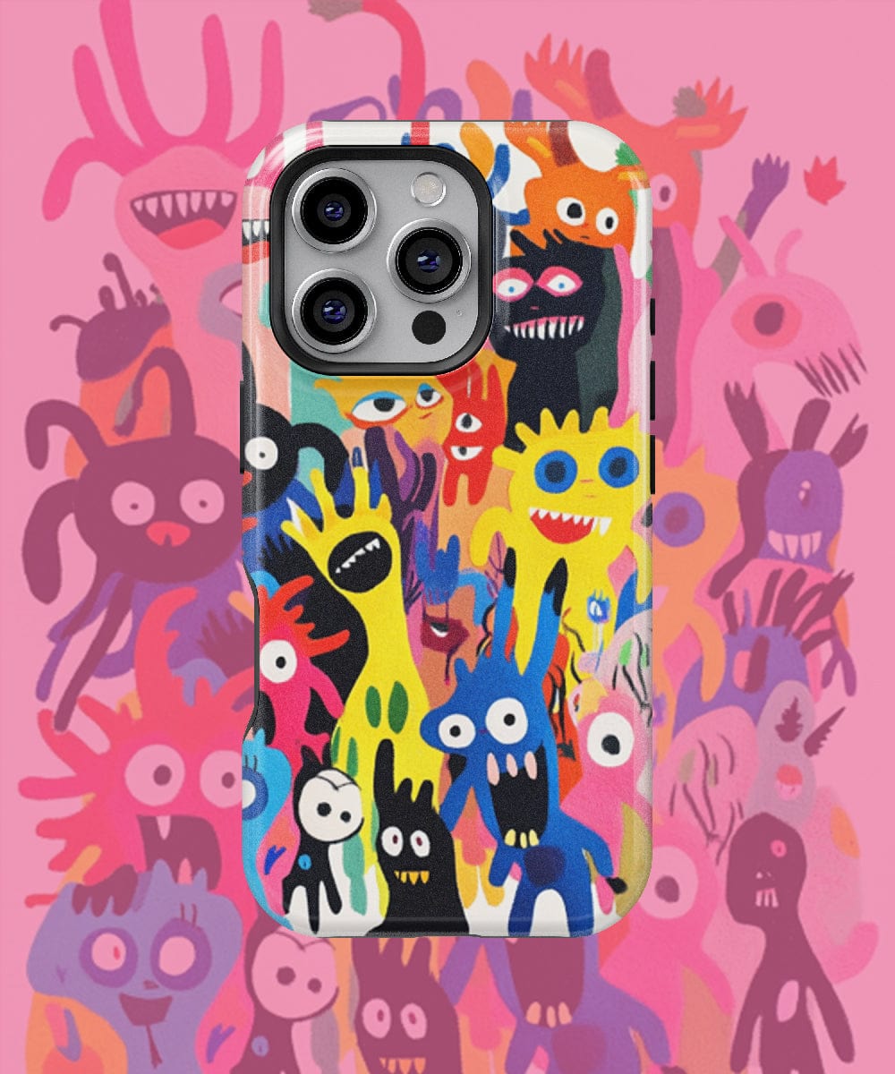 The Quirky Cartoon Monster iPhone 16 Pro Max Case – MagSafe Compatible, Slim Fit, Shockproof PC + Silicone Cover showcases vibrant monster illustrations against a similarly playful background.