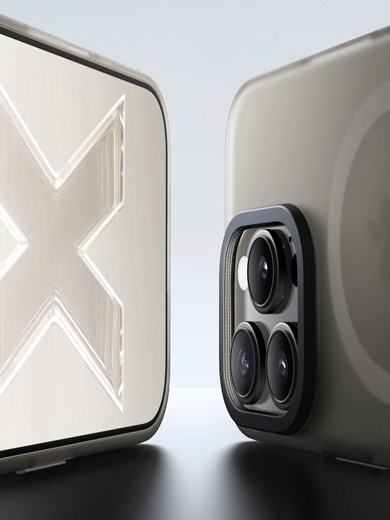 Two smartphones with matte finishes are positioned back-to-back. The left phone, encased in the iPhone 16 Pro Max MagSafe Case | X-002 Hdens Matte Finish Shockproof Cover, displays a large "X" symbol, while the right phone showcases a triple camera setup featuring shockproof technology.