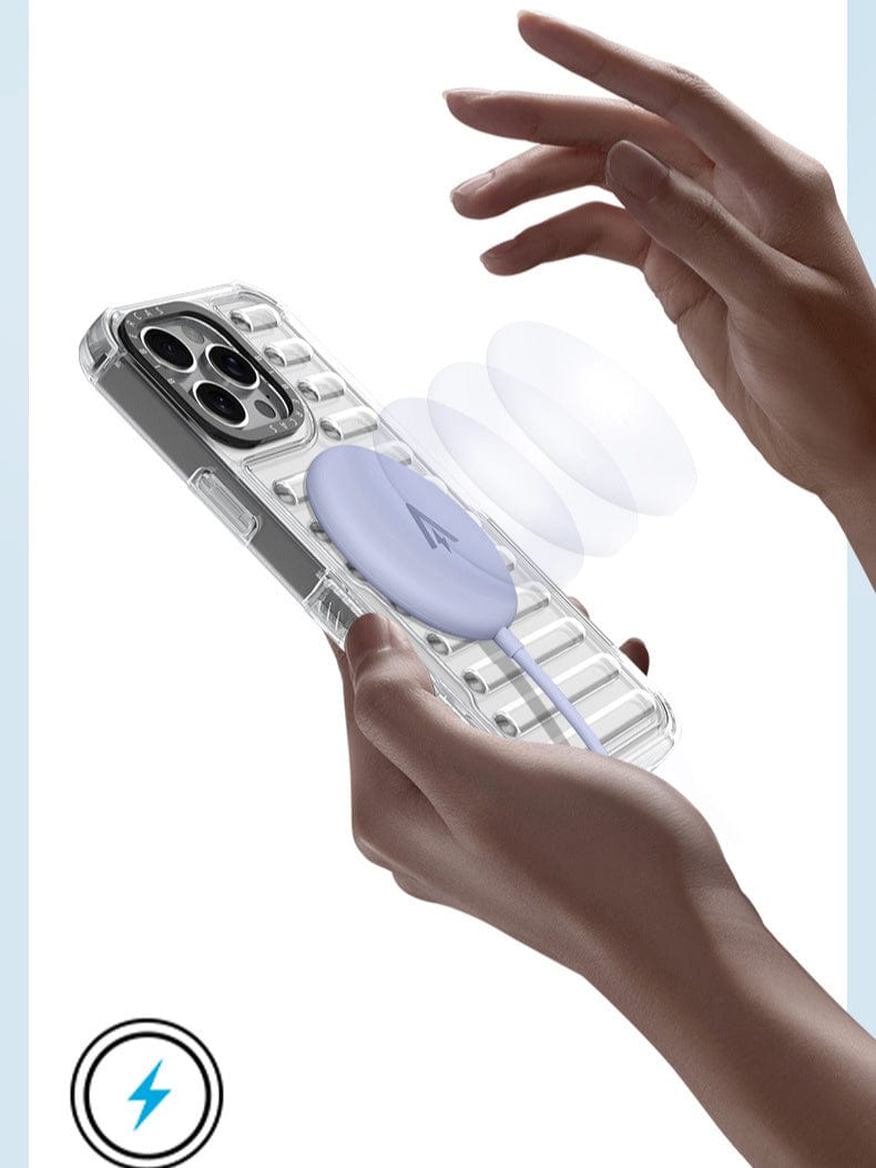 Hands holding an iPhone 16 Pro Max Clear Air Cushion Case with a transparent design, featuring Shockproof TPU & PC Hybrid Cover and an attached circular wireless charger.