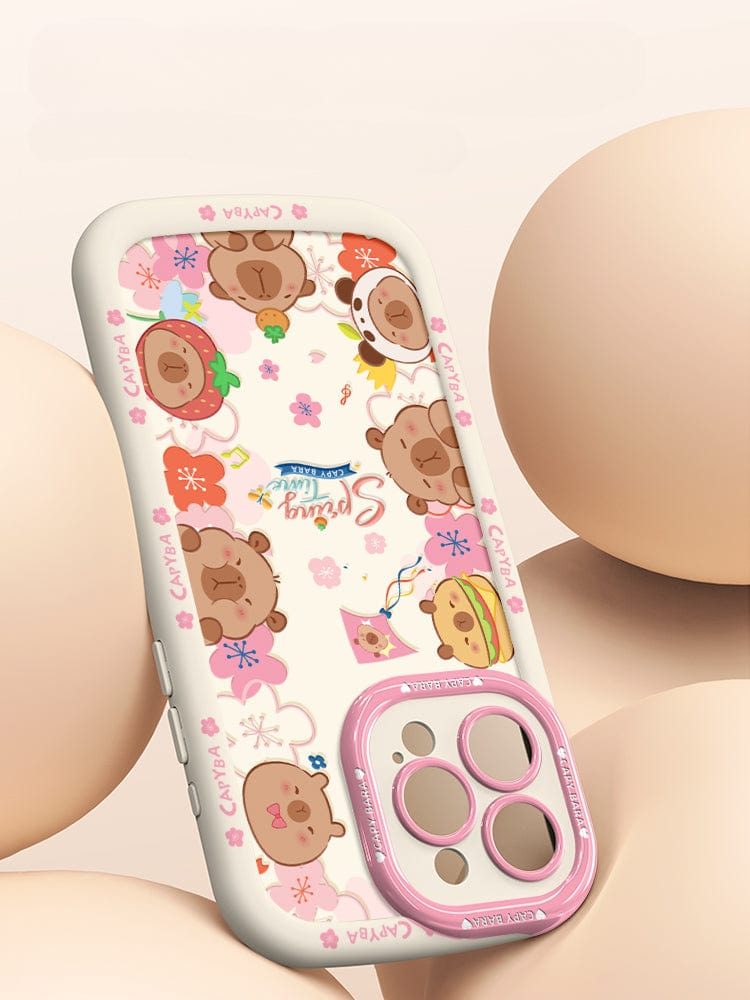 An iPhone 16 Pro Max Cute Bear Silicone Case showcasing playful cartoon bear heads with various accessories. This case features a predominantly dark design accented with floral elements and the "Spring Time" text at its center. It offers not just style but also shockproof protection due to its soft touch liquid silicone construction, ensuring durability and anti-scratch properties.