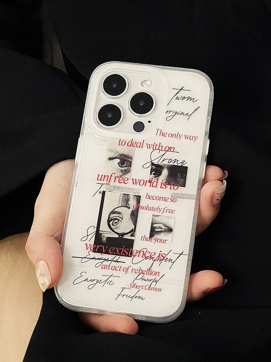 A hand holding a smartphone with the Existential Freedom iPhone 16 Pro Max Case, featuring artistic typography and layered text that includes phrases like "The only way to deal with an unfree world is to become so absolutely free that your very existence is an act of rebellion.