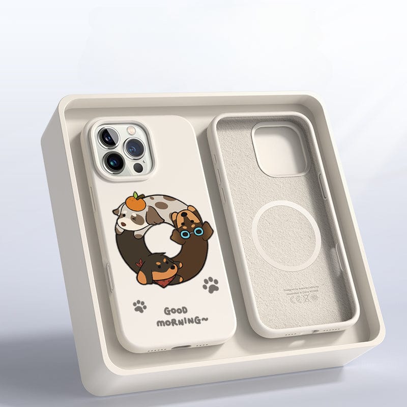 Introducing the iPhone 16 Pro Max Case - Good Morning Cartoon Dog Silicone Protective Cover. This white case features an adorable design of a dog, bear, and chick sleeping in a ring with the text "Good Morning~" at the bottom. It offers triple-layer shockproof protection, is anti-yellowing, washable, and comes beautifully displayed in packaging.