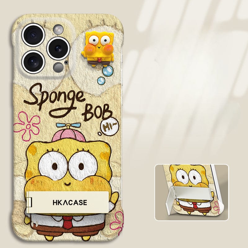 Introducing the iPhone 16 Pro Max Ultra-Thin Frameless Case in bright pink and yellow, featuring a playful SpongeBob SquarePants design complete with flowers, a pop-up character, and the word "SpongeBob." The case also includes a foldable stand for convenience.