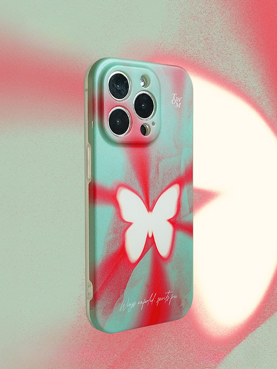 A Butterfly Aura iPhone 16 Pro Max Case with a vibrant red and green butterfly-themed design is set against a matching red and green gradient background. This artistic all-inclusive protective cover, featuring three camera lenses and text near the bottom, seamlessly combines style and functionality.