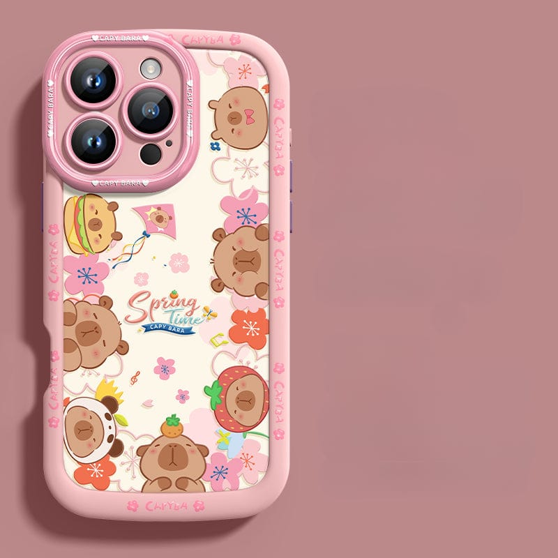 An iPhone 16 Pro Max Cute Bear Silicone Case showcasing playful cartoon bear heads with various accessories. This case features a predominantly dark design accented with floral elements and the "Spring Time" text at its center. It offers not just style but also shockproof protection due to its soft touch liquid silicone construction, ensuring durability and anti-scratch properties.