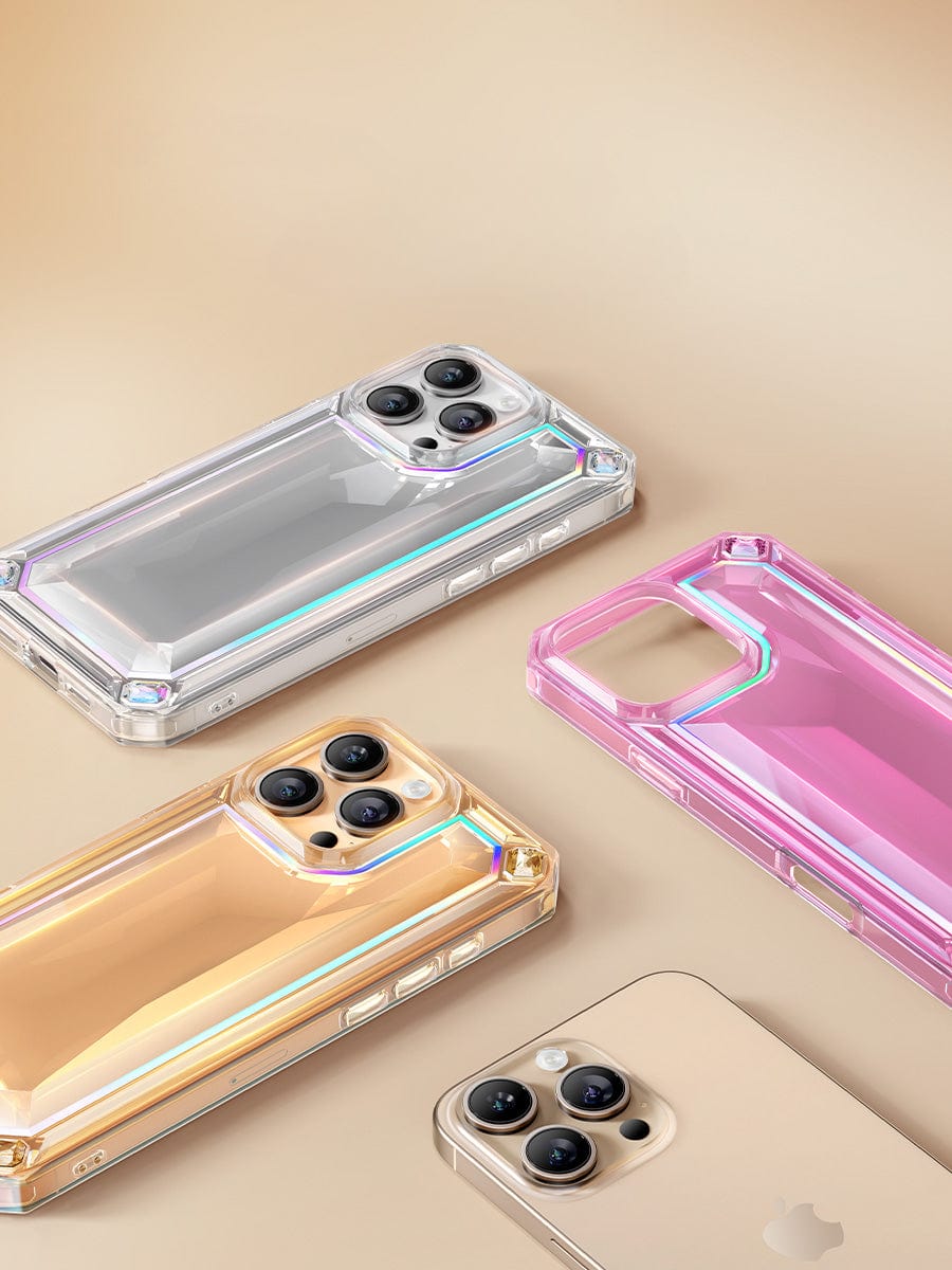 Four iPhone 16 Pro Max Cases - Shockproof 360° Clear Anti-Fall Protective Covers with 3D gem designs, featuring glossy, reflective finishes in clear, gold, and pink. Laid flat on a beige surface, these cases boast anti-yellowing material to keep them looking fresh.