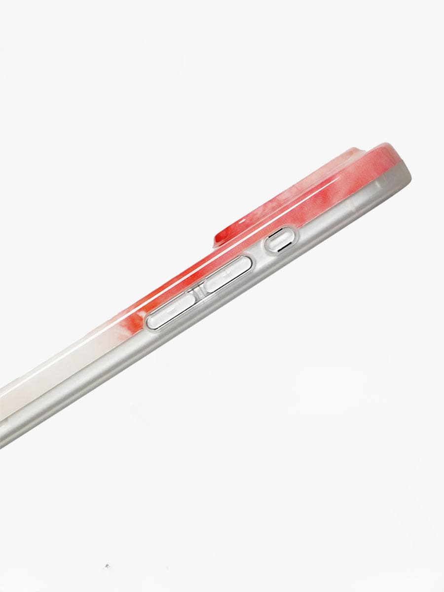 Side view of an iPhone 16 Pro Max adorned with the Red Eye Art iPhone 16 Pro Max Case, showcasing bold artistic expression with a partially red design. Visible are the volume control buttons and a small switch, all set against a clean, white background.