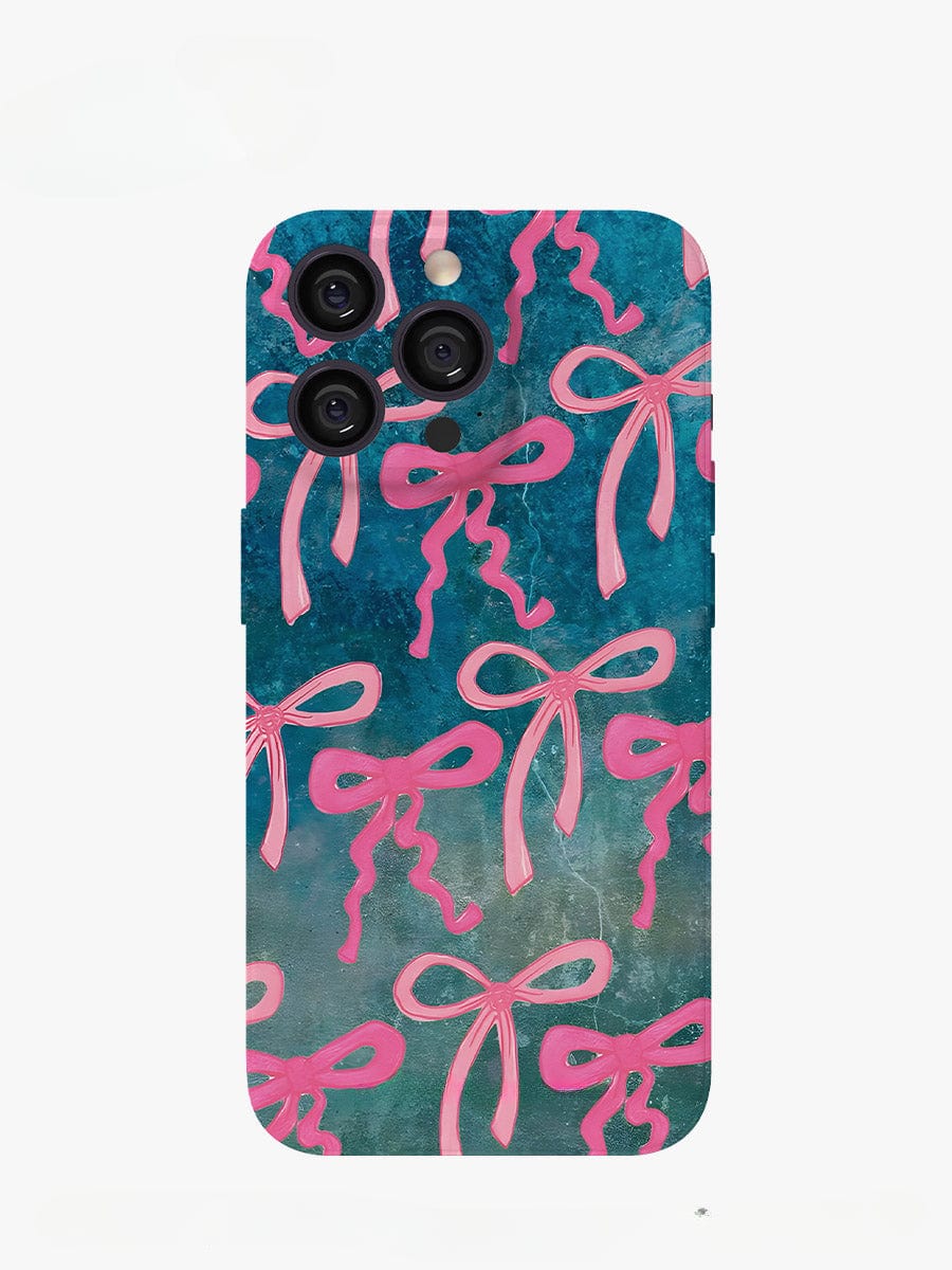 The Pink Ribbon Charm iPhone 16 Pro Max Case features a teal background decorated with multiple pink ribbon bows. With three camera lens cutouts at the top left, this stylish all-inclusive protective cover offers an artistic and playful look.