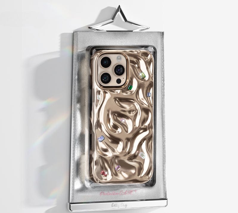 Luxury phone case for iPhone 16 Pro Max featuring a gold-tone textured design with N52 magnets for MagSafe compatibility and adorned with handcrafted gemstone detailing on a silver star-shaped stand. Crafted from durable PC material, this exquisite case is enhanced with embedded gems.