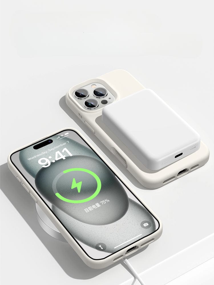 Two smartphones are shown, one displaying a battery charging animation and the other with a battery pack attached. Both are laid on a white surface, one of them encased in an iPhone 16 Pro Max MagSafe Liquid Silicone Case – Cute Cat Paw Design, ensuring it's MagSafe compatible for effortless charging.