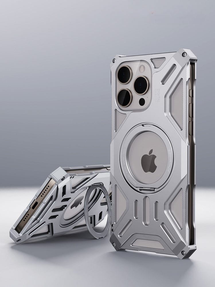 Two iPhone 16 Pro Max devices in premium aerospace aluminum MagSafe cases, one standing upright displaying the rear camera and Apple logo, and another lying flat showcasing its side profile, bottom ports, and the 360° ring kickstand of the shockproof metal cover.