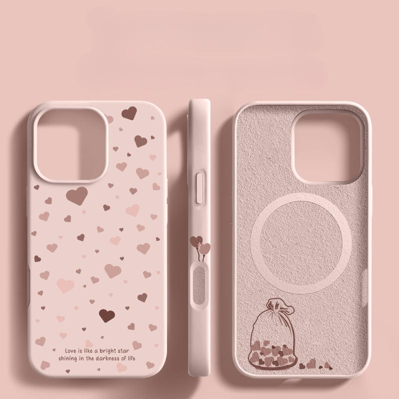 Three iPhone 16 Pro Max Soft Liquid Silicone Protective Covers with Shockproof Design and Anti-Fingerprint Coating are displayed: front, side, and back views. Made from food-grade silicone, they are pink with heart designs. The front view has heart patterns, the side view has a small drawing of two hearts, and the back view features a heart jar.