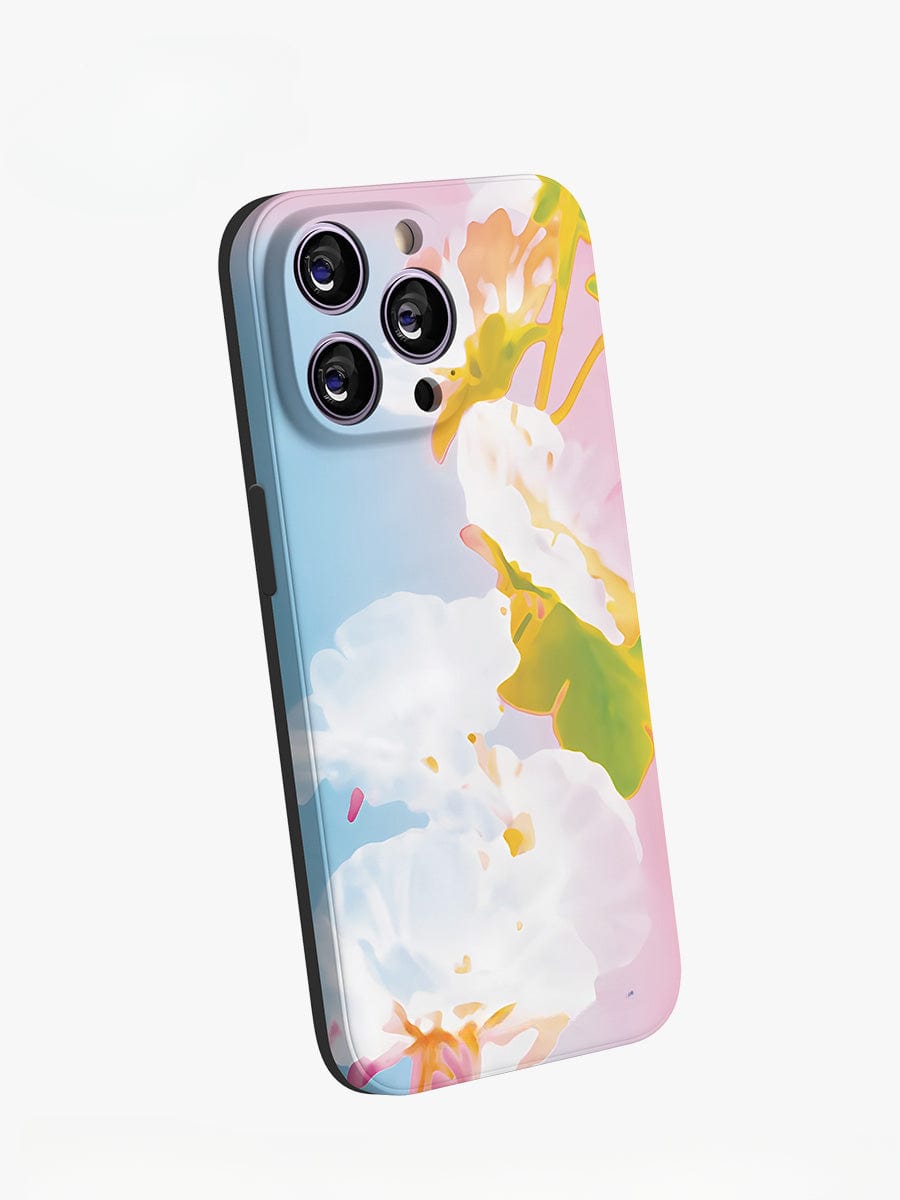 Check out the Pastel Bloom iPhone 16 Pro Max Case with a soft floral design, elegantly showcasing the rear camera setup and providing a partial view of the side buttons.