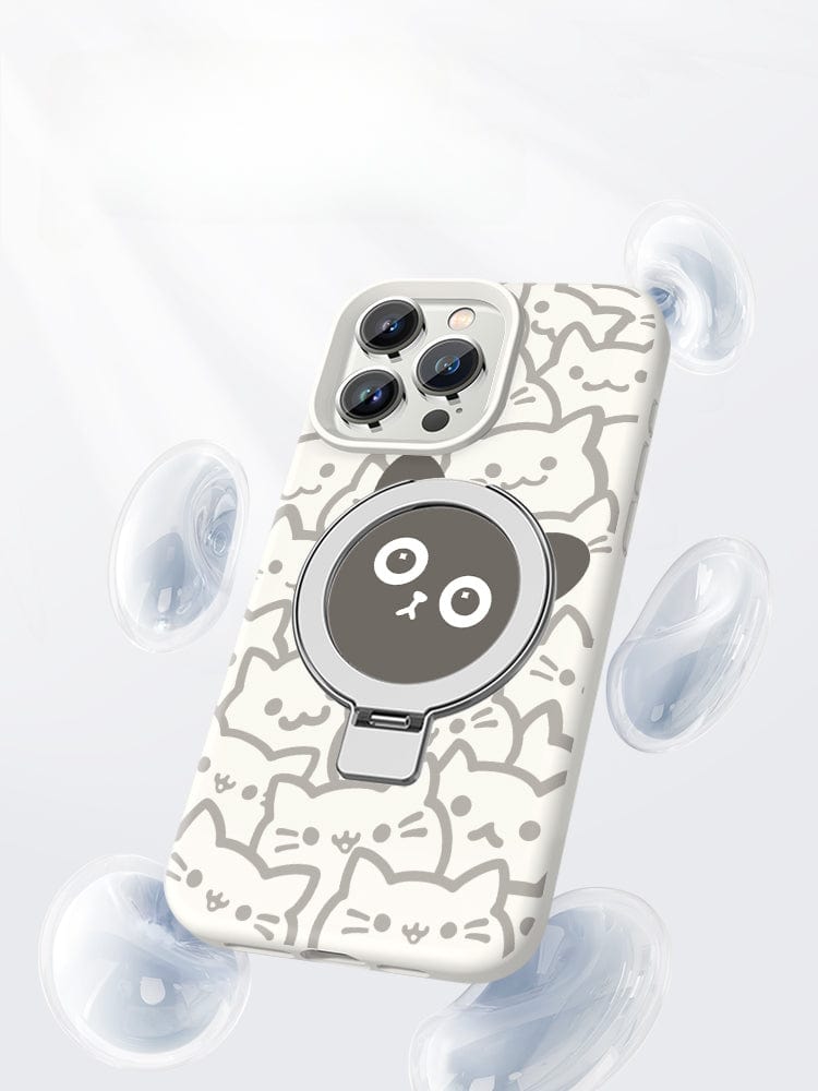 An iPhone 16 Pro Max encased in a Liquid Silicone Kickstand Case, showcasing a cute cat design and built-in foldable stand, is displayed against a light background with bubbles.