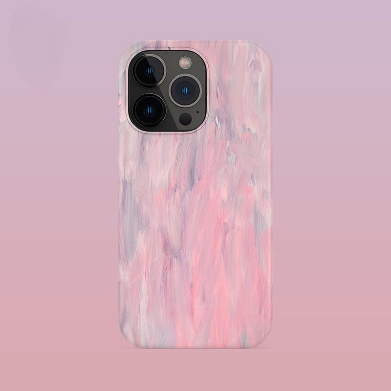 The Pastel Brushstrokes iPhone 16 Pro Max Case - Soft Artistic Design with Full Protection, featuring a pink and gray abstract painted pattern, is displayed against a pink and purple gradient background. The phone's prominent triple camera setup is clearly visible.