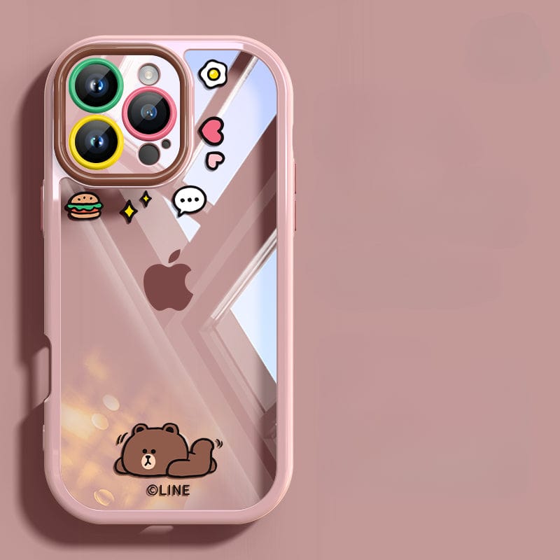 A smartphone with an iPhone 16 Pro Max case featuring a small bear illustration, a speech bubble, and various colorful stickers such as a heart, a burger, sparkles, and a star. This clear protective cover offers shockproof protection and anti-scratch lens durability for enhanced resilience.