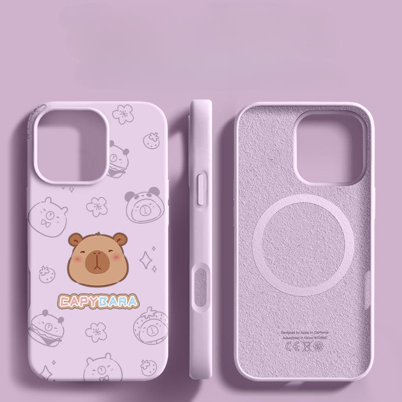 Two purple "iPhone 16 Pro Max Cases - Cute Capybara Silicone Protective Cover" with cutesy capybara cartoon designs. One case showcases the back, featuring "Capybara" text and images, while the other reveals the interior and side, emphasizing their all-around protection with a triple-layer shockproof structure and anti-fingerprint coating.