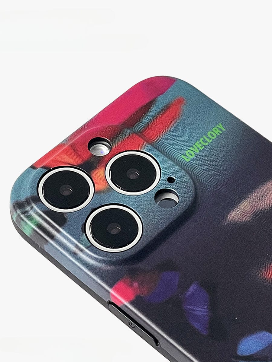 Close-up of the back of an iPhone 16 Pro Max with three camera lenses, showcasing the artistic, colorful gradient design of the Vibrant Butterfly Night iPhone 16 Pro Max Case.