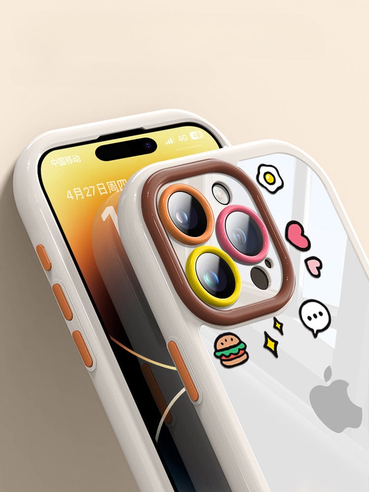 This iPhone 16 Pro Max Case - Cute Cartoon Clear Protective Cover with Shockproof Bumper and Anti-Yellowing Transparent Back boasts a white background adorned with a playful cartoon design around the camera, featuring a burger, speech bubbles, and flowers. The date displayed on the screen is April 27.