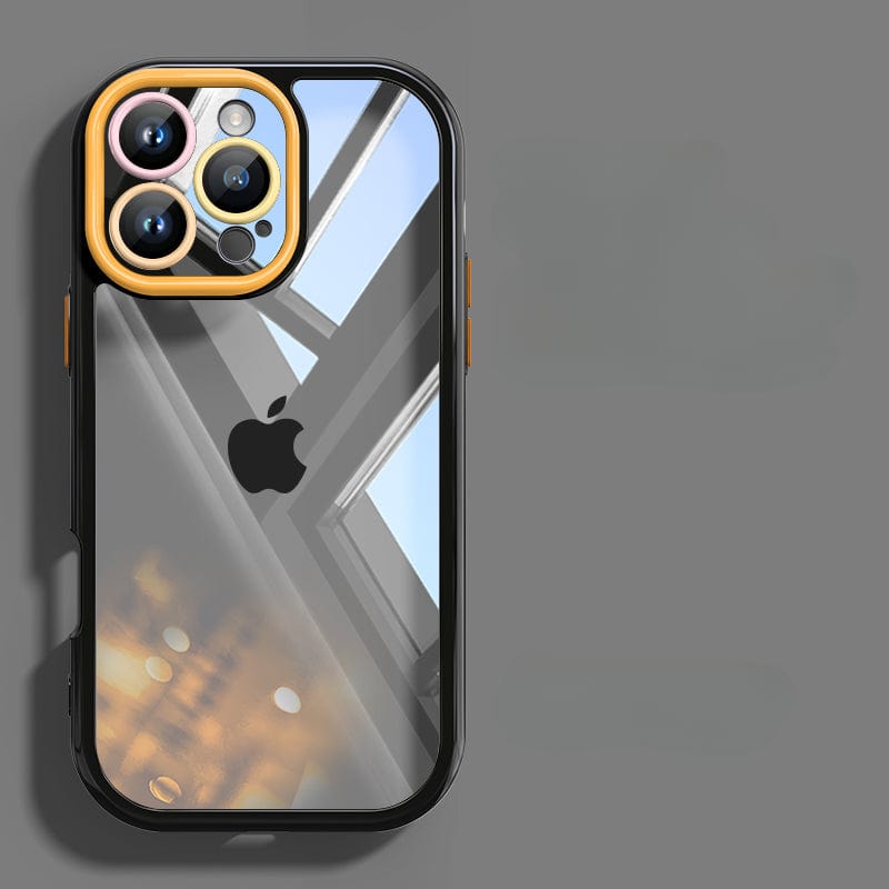 A sleek iPhone 16 Pro Max Clear Case, made of transparent silicone, is displayed with durable shockproof protection. The reflective case shows a window and ceiling lights while highlighting a prominent camera module featuring three lenses, a flash, and a colorful yellow ring.