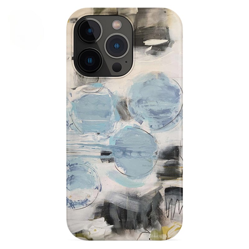 A smartphone encased in the Abstract Blue Circles iPhone 16 Pro Max Case - Modern Art-Inspired Design with Full Protection. The case showcases a pattern of large blue circles, complemented by black, gray, and white brushstrokes on a light background. The camera module is clearly visible in the upper-left corner.