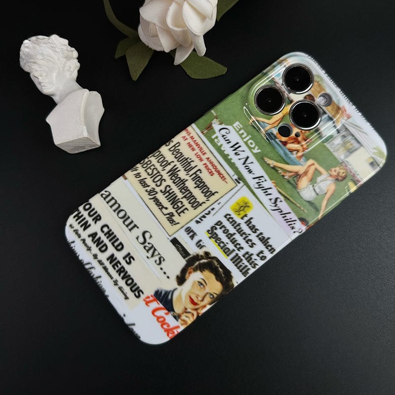 A Vintage Advertisement Collage iPhone 16 Pro Max Case - Retro Pop Art Design with Full Protection lies on a dark surface. The case is adorned with multiple vintage-style illustrations of women and text featuring promotional content. Nearby, there is a small white decorative bust and some white flowers.