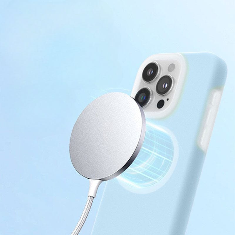 A magnetic wireless charger is attached to the back of an iPhone 16 Pro Max protected by a MagSafe Compatible iPhone 16 Pro Max Case - Premium Liquid Silicone Gel, Crystal Clear Jelly-Like Protective Cover.