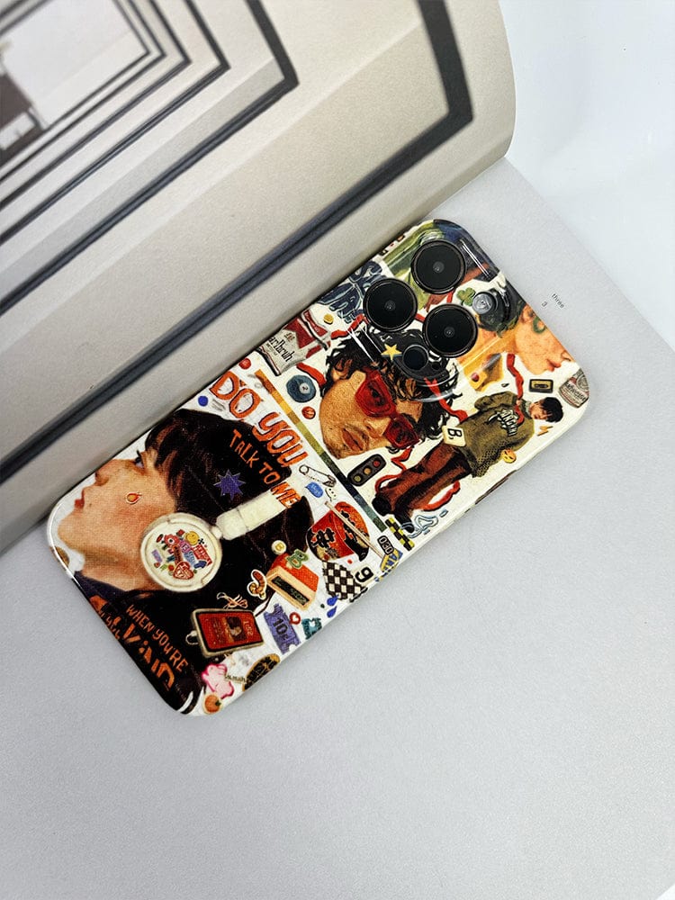 A smartphone lies on an open book. The Retro Collage iPhone 16 Pro Max Case - Artistic and Protective is adorned with a colorful, collage-style design featuring various illustrations, including faces, objects, and text fragments. The camera lenses are visible at the top right corner of the phone.