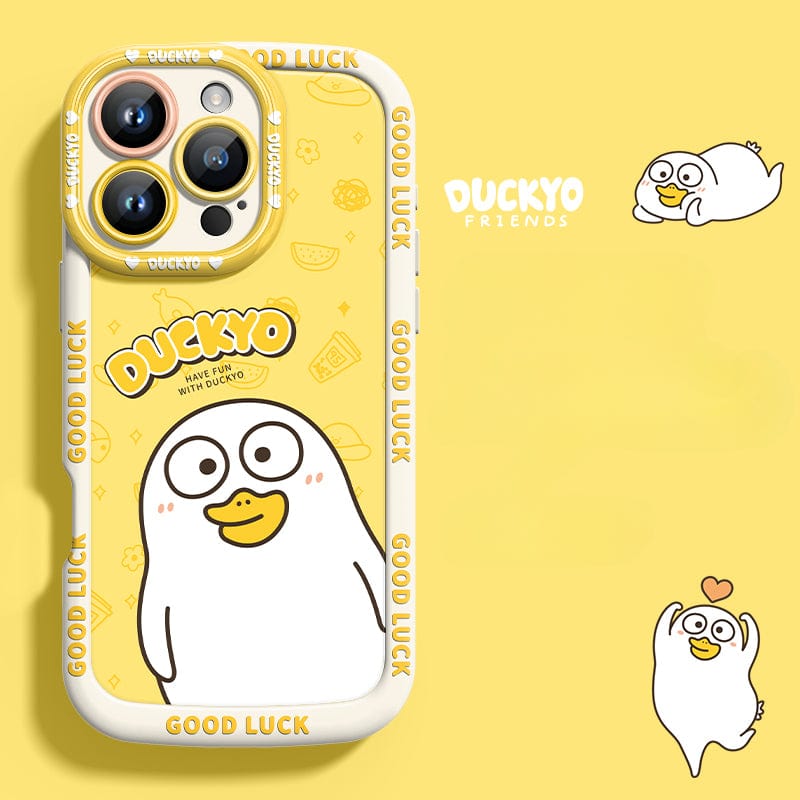 The iPhone 16 Pro Max Yellow Duck Cartoon Case is crafted from soft liquid silicone and showcases a cute duck illustration accompanied by the text "DUCKYO" and the repeated phrase "GOOD LUCK." It features small background illustrations along with "Have Fun with Duckyo" text, offering shockproof protection while maintaining a slim fit. Additionally, it boasts anti-yellowing properties to keep your case looking fresh.