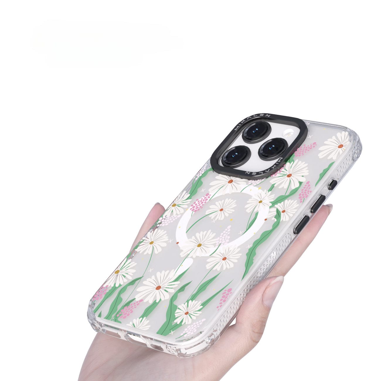 A person with manicured nails holding the Floral MagSafe iPhone 16 Pro Max Case, a clear cover adorned with 3D white daisies and green leaves, highlighting its shockproof protection.