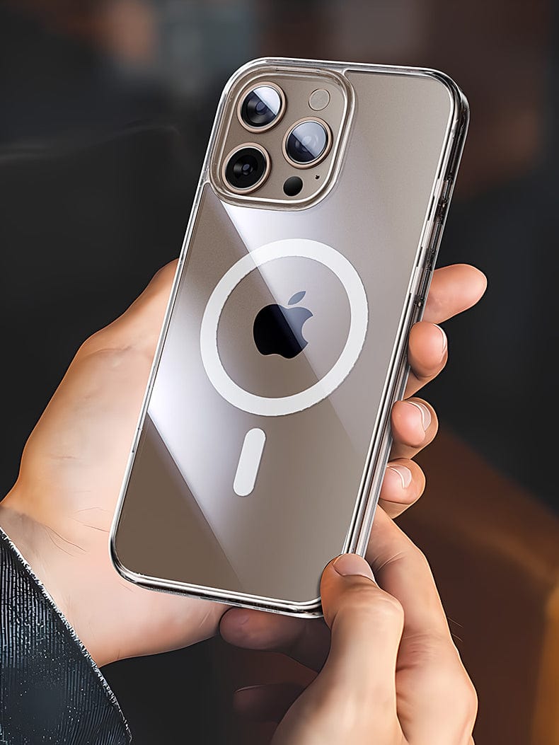 A person holding an iPhone with a clear case that reveals the MagSafe circle and Apple logo showcases the iPhone 16 Pro Max Clear Case, featuring anti-yellowing, anti-fingerprint properties, magnetic adsorption, and a responsive camera button.
