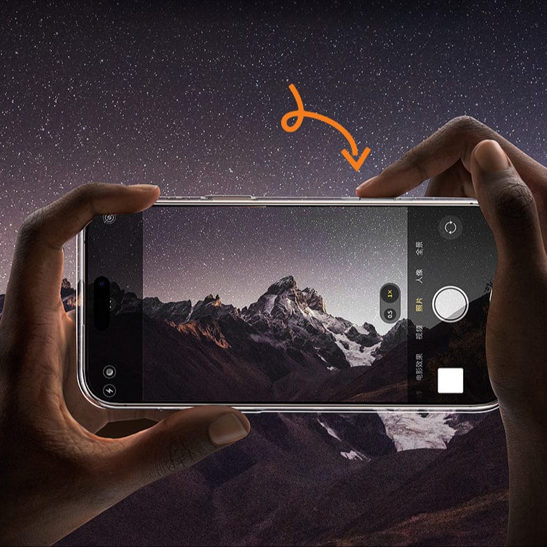 A person holds a smartphone horizontally, capturing a photo of snow-capped mountains under a starry night sky. An orange arrow points to the phone's screen, showcasing the iPhone 16 Pro Max Clear Case with its anti-yellowing, anti-fingerprint surface, magnetic adsorption and responsive camera button.