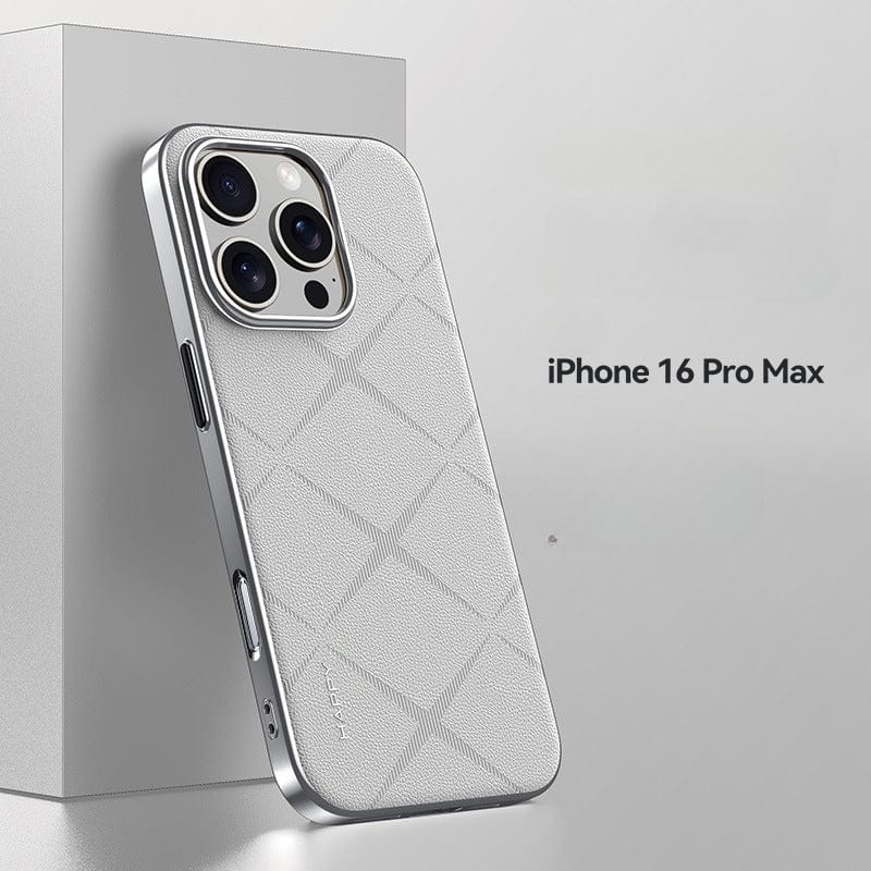 A white iPhone 16 Pro Max, encased in a premium leather cover with a shockproof design and metal button finish, is displayed standing against a light gray background. The durable design ensures superior camera protection. The text "iPhone 16 Pro Max Premium Leather Case" is visible to the right of the phone.