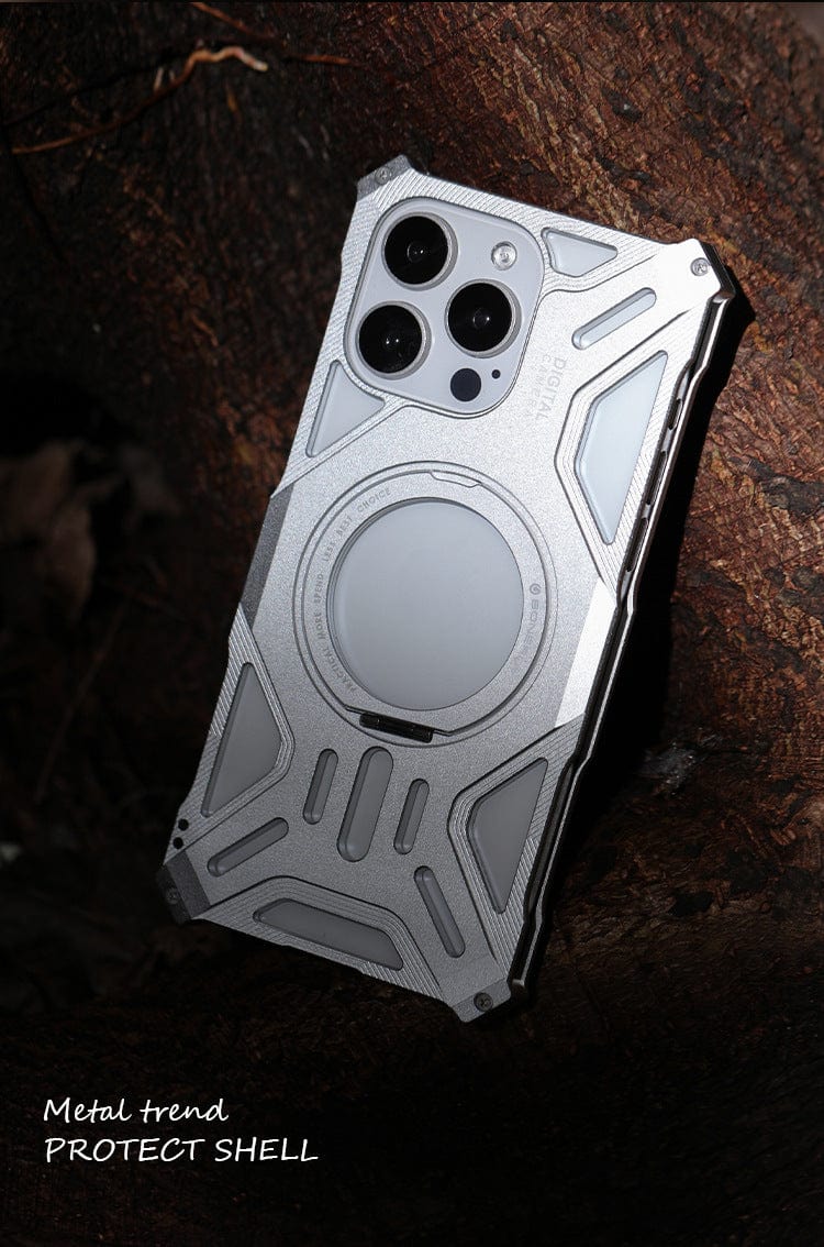 An iPhone 16 Pro Max Aerospace Aluminum MagSafe Case featuring a rugged geometric design and a circular central element with triple rear camera cutouts. The text reads, "Metal trend PROTECT SHELL".