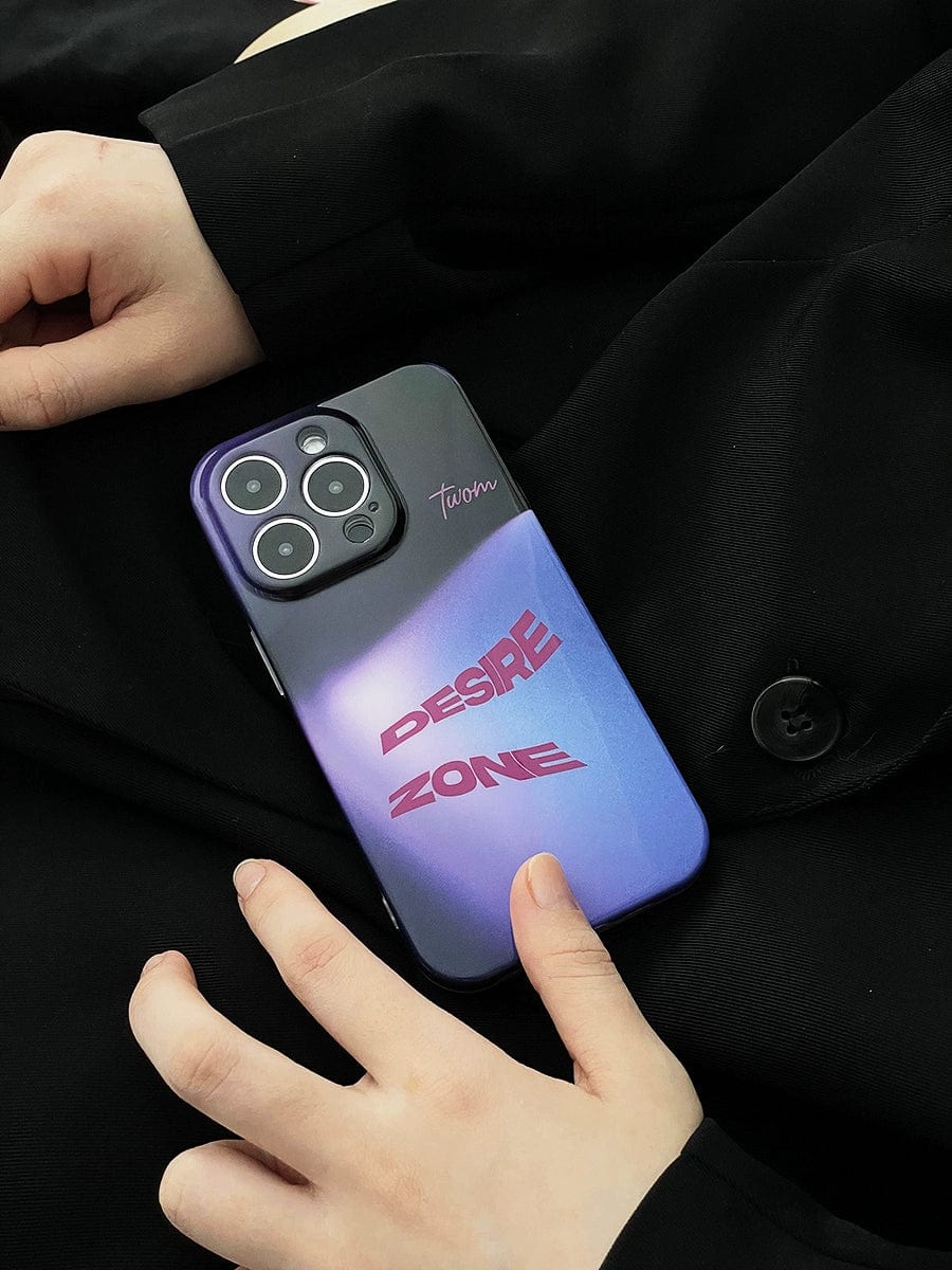 A person in black clothing is holding an iPhone 16 Pro Max adorned with a Desire Zone Gradient Urban Style case. The sleek, all-inclusive protective cover is a gradient of purple and black, featuring the text "DESIRE ZONE" in bold red letters and the smaller text "Tiaom" near the camera, which boasts three lenses.