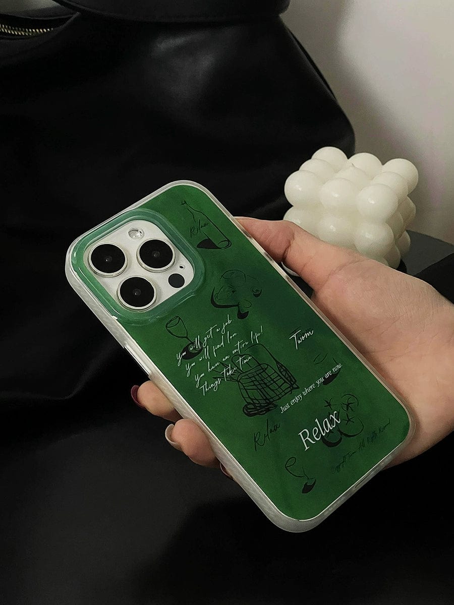 A hand holds a smartphone encased in a green, text-covered shell. The Relax Green iPhone 16 Pro Max Case, featuring abstract illustrations and the words "Relax," "Think," and "You did great today," offers an artistic minimalist design with all-inclusive protection.