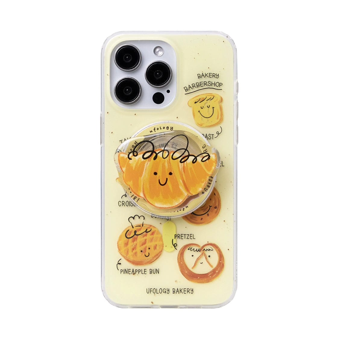 A smartphone with a Bakery Friends MagSafe iPhone 16 Pro Max Case featuring various cartoon pastries with smiling faces, including a croissant, toast, pineapple bun, pretzel, and a central pastry on the bun stand. The case also features labels such as "Bakery," "Barbershop," and "Ufology Bakery.