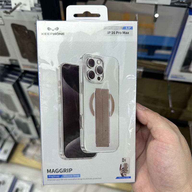 A hand holding the Keephone iPhone 16 Pro Max Military-Grade MagSafe Case, a packaged clear protective cover featuring a built-in silicone grip strap titled "MagGrip," offering military-grade protection and designed specifically for the iPhone 16 Pro Max.