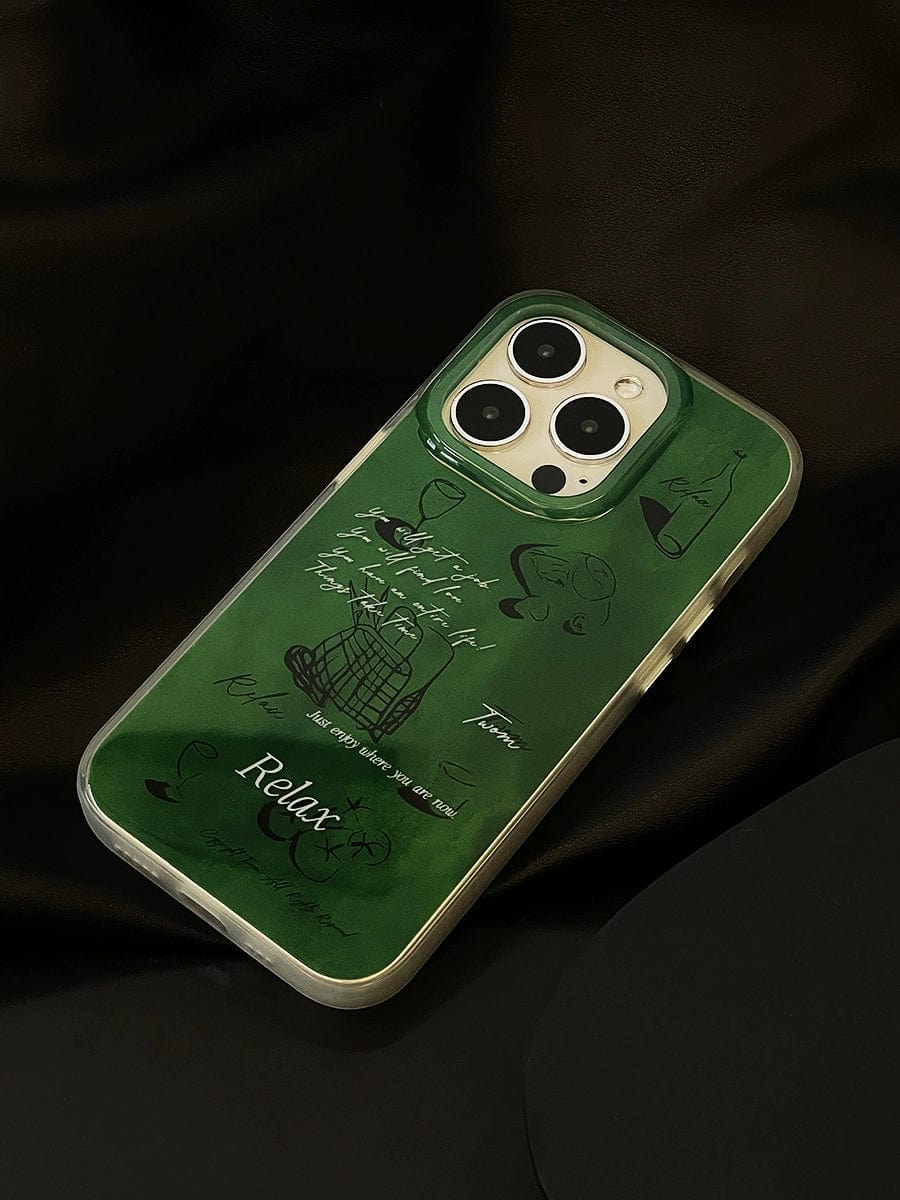 The Relax Green iPhone 16 Pro Max with an all-inclusive protective case, featuring artistic minimalist designs and whimsical illustrations, lies elegantly on a dark surface.