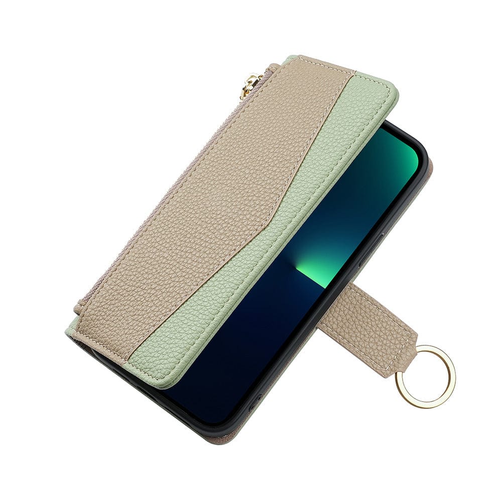 A Crossbody Wallet Case for iPhone 16 Pro Max, featuring a stylish beige and mint green PU leather finish, equipped with a built-in mirror, card slots, hidden stand, and detachable strap. The case showcases a wallet-style design with a zippered pocket and ring holder, highlighting a smartphone partially inside.