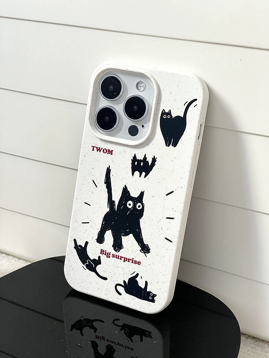 The Big Surprise Black Cat iPhone 16 Pro Max Case features a speckled white design adorned with various black cat illustrations. At the center, there’s a cat accompanied by the text "Big surprise," with other cats depicted in playful poses around it. The word "TWOM" is positioned above the center cat, all set against a white background. This all-inclusive protective cover combines functionality with a whimsical cartoon design.