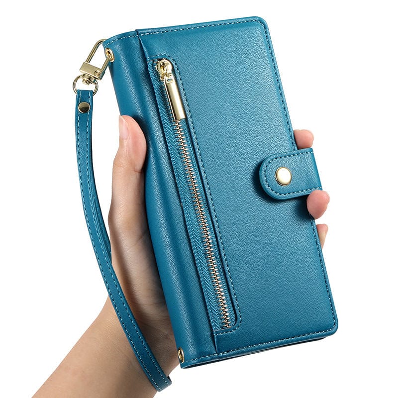 Hand holding an iPhone 16 Pro Max Wallet Case with a wrist strap and a zippered pocket on the front, crafted from premium leather.