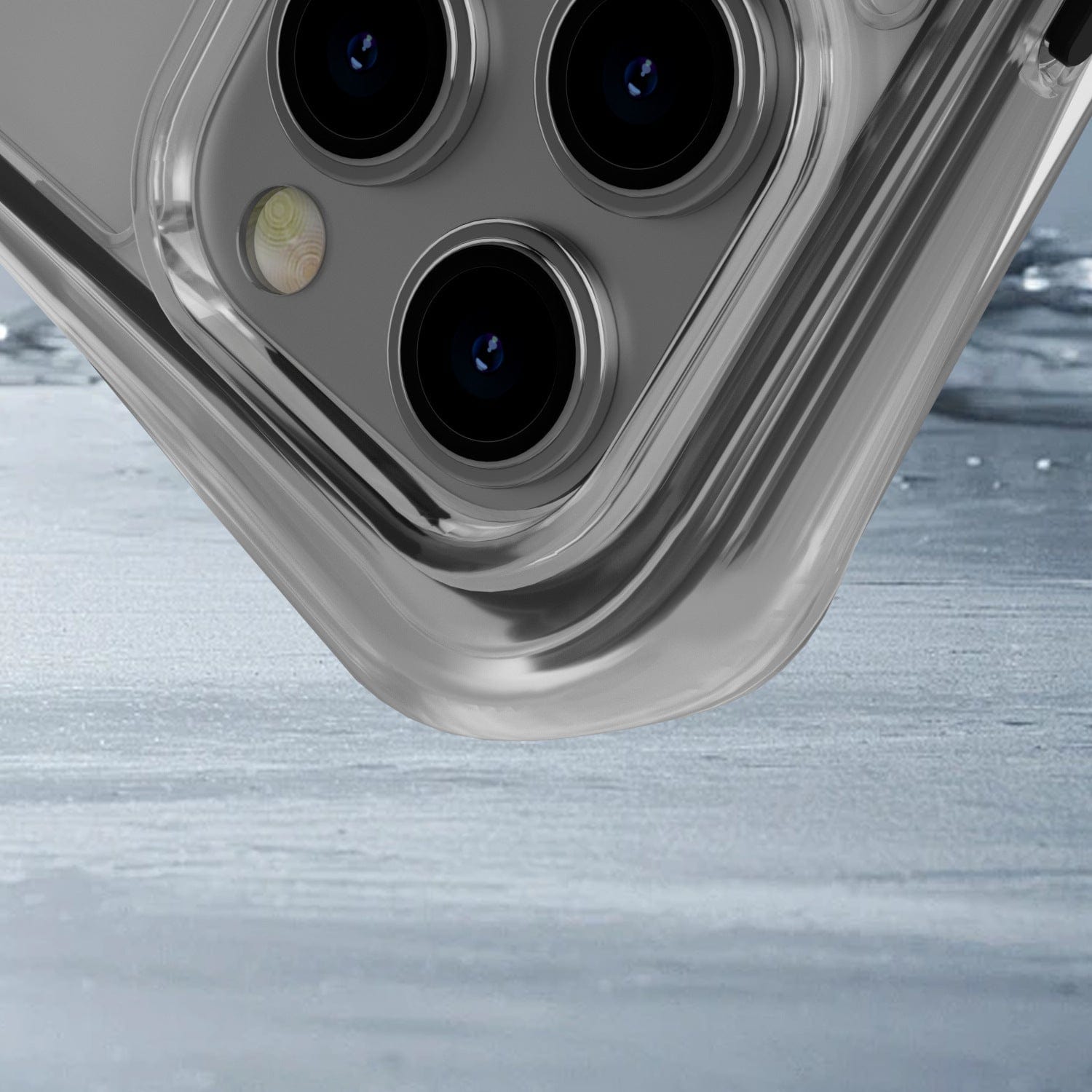 Close-up of an iPhone with three camera lenses, partially submerged in water. The phone appears to be in the iPhone 16 Pro Max Air Cushion MagSafe Case | 360° Shockproof Clear Protective Cover featuring Advanced Air Cushion Design.