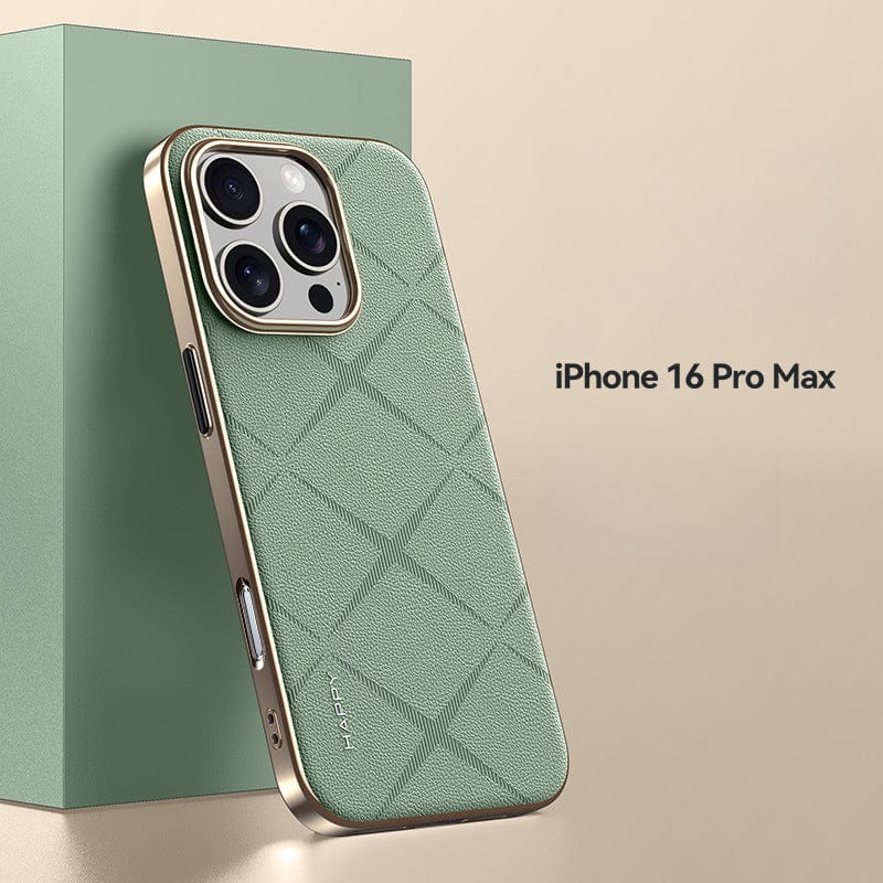 The iPhone 16 Pro Max is encased in a Premium Leather Case that features a green hue, diamond pattern, and gold edges, providing superior camera protection. Placed beside a green block against a beige backdrop, this shockproof and durable case with metal button finishes offers a stylish and reliable solution for your device.