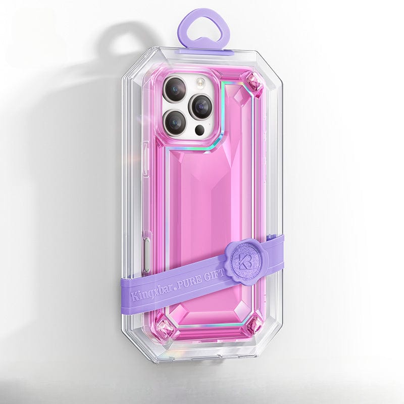 A rose-colored smartphone encased in the 'iPhone 16 Pro Max Case - Shockproof 360° Clear Anti-Fall Protective Cover with 3D Gem Design,' featuring a purple strap that reads "Kinyiba-PURE GIFT," offering complete all-around protection.