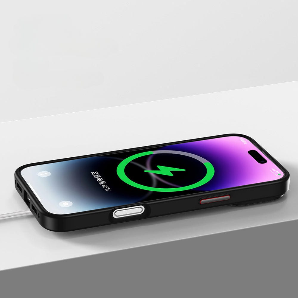 A smartphone with a MagSafe Compatible iPhone 16 Pro Max Case - featuring a Matte Finish, TPU+PC Material, Metal Camera Ring & Buttons, and offering Shockproof & Anti-Fingerprint protection - is placed on a white surface, showing a charging screen with a green battery icon and a lightning bolt indicating the device is charging.