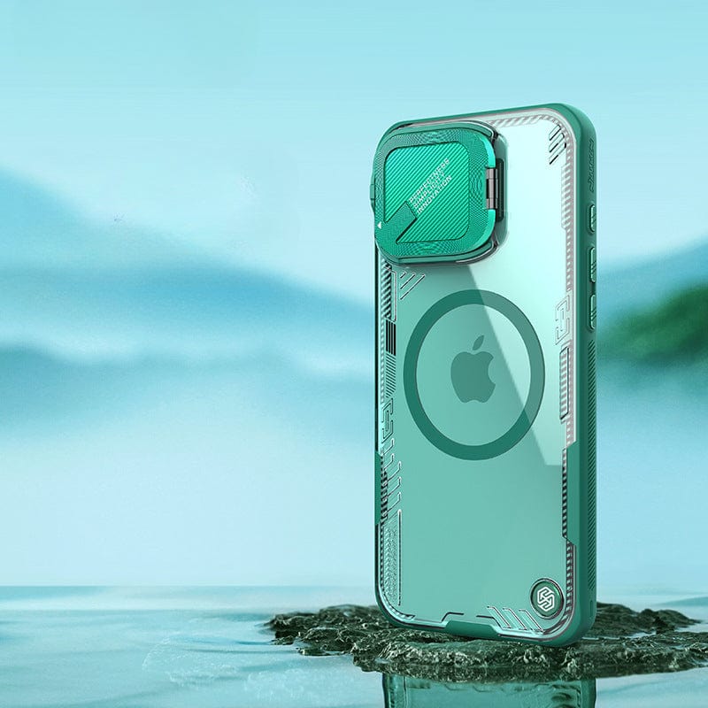 A green MagSafe Compatible iPhone 16 Pro Max Case with a protective camera cover is displayed against a blurred outdoor background. The Apple logo and circular design on the back of the eco-friendly, shockproof TPU, bio-based PC, and aluminum case are visible.